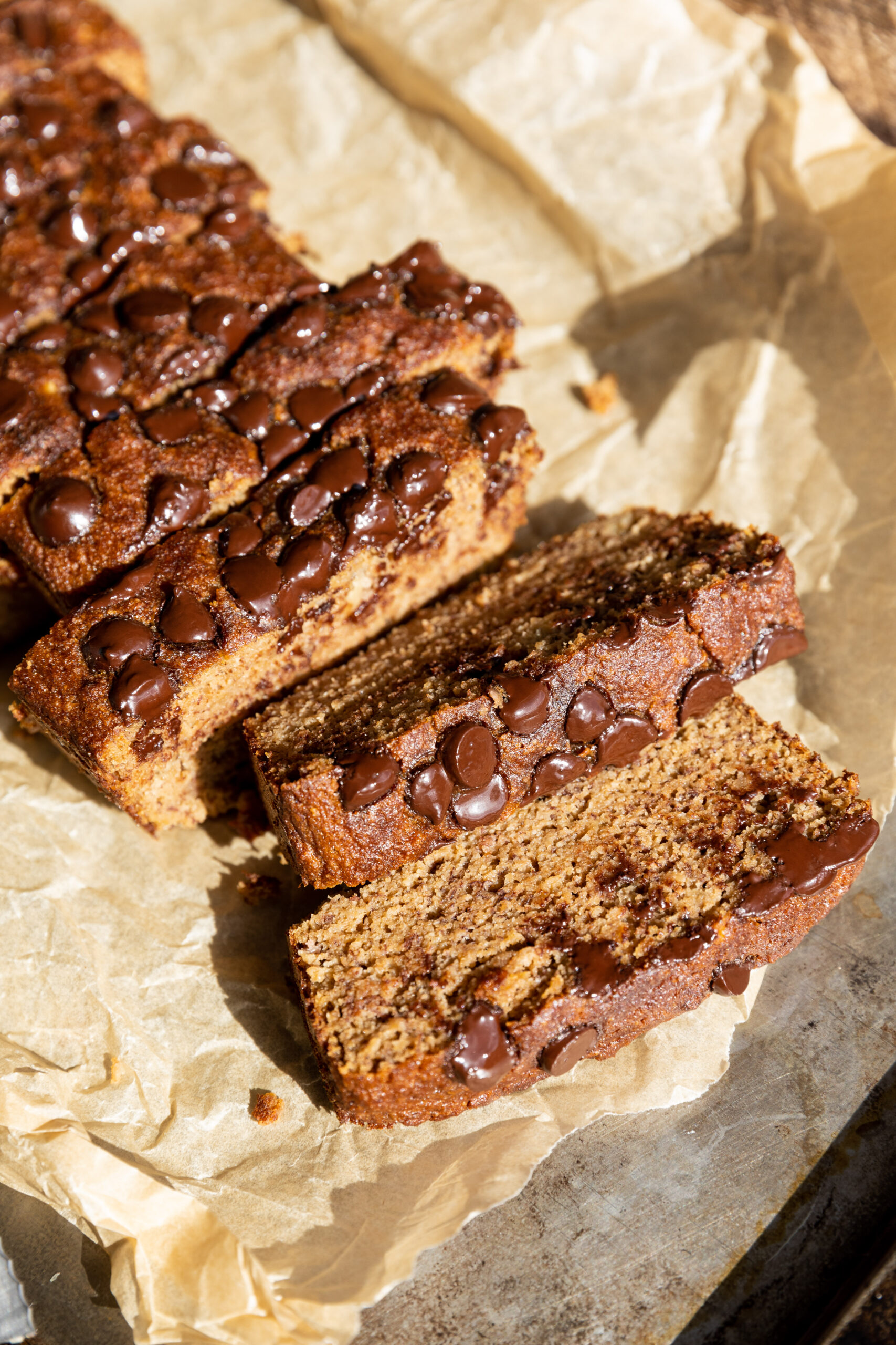 Close up picture of chocolate chip banana bread cut into slices.