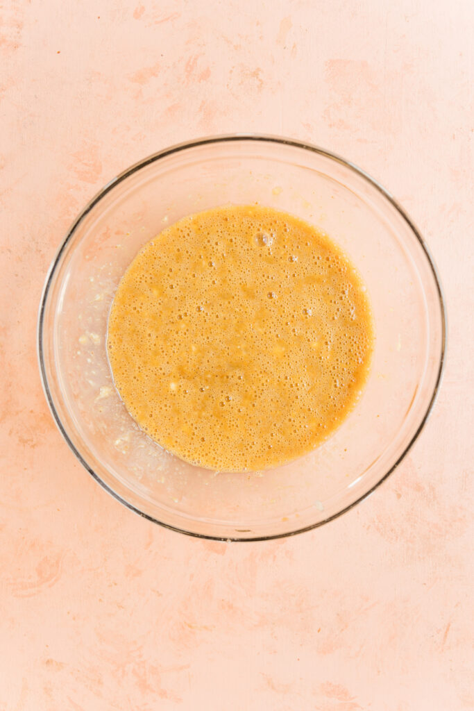 Wet ingredients in a mixing bowl.