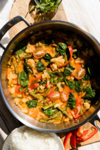 Big pan filled with vegetable curry.
