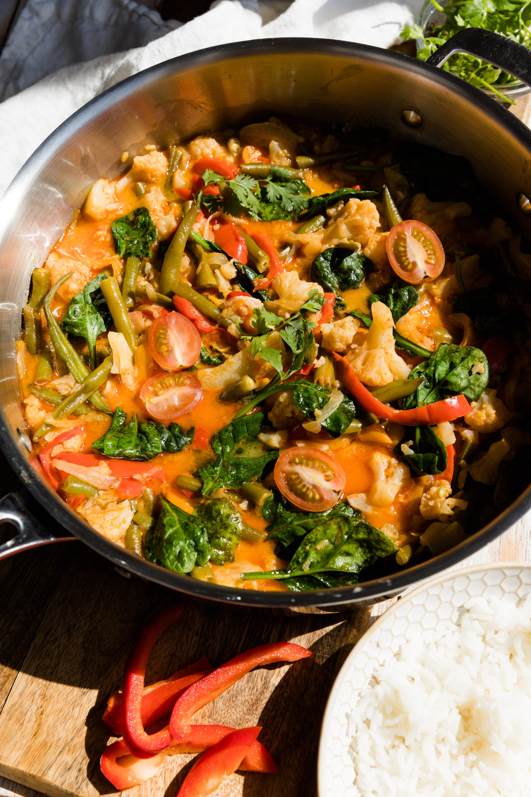 Vegetable curry in large pan.
