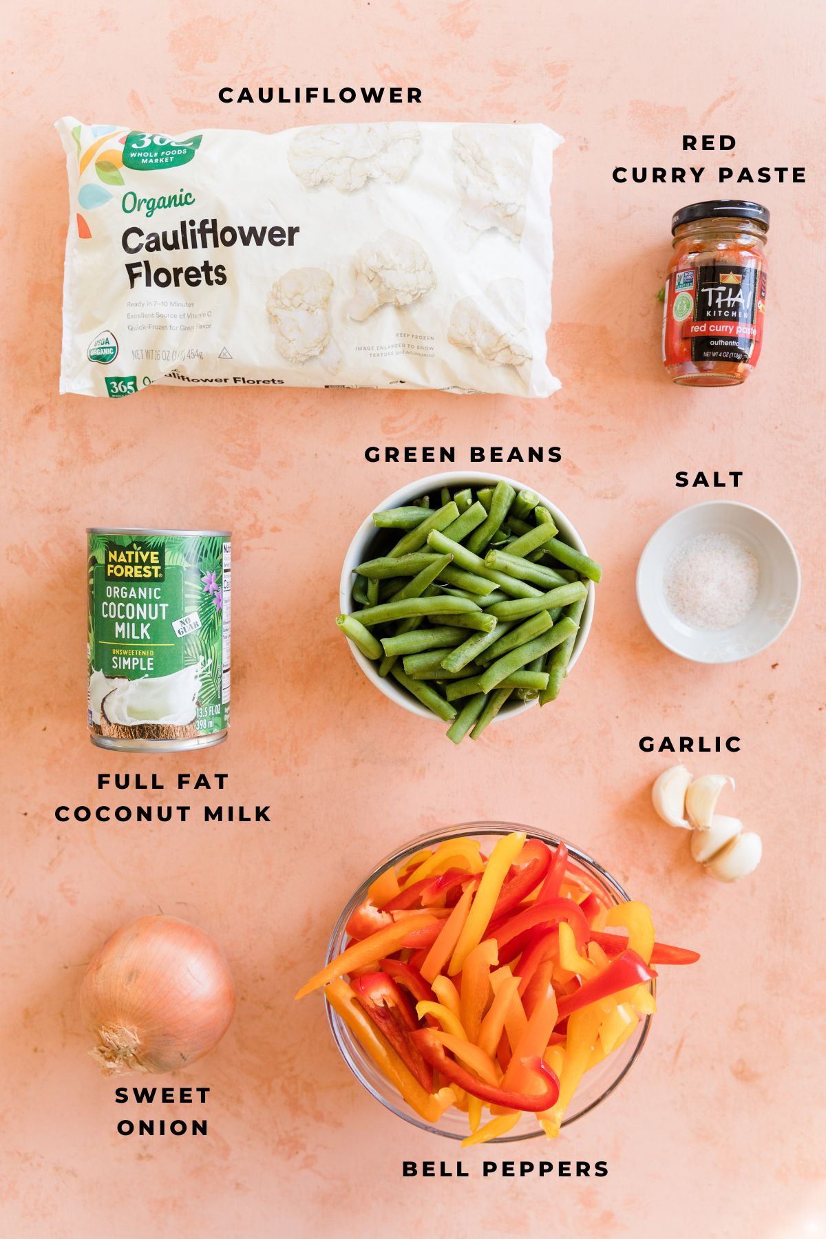 Ingredients measured out for red thai curry with vegetables.