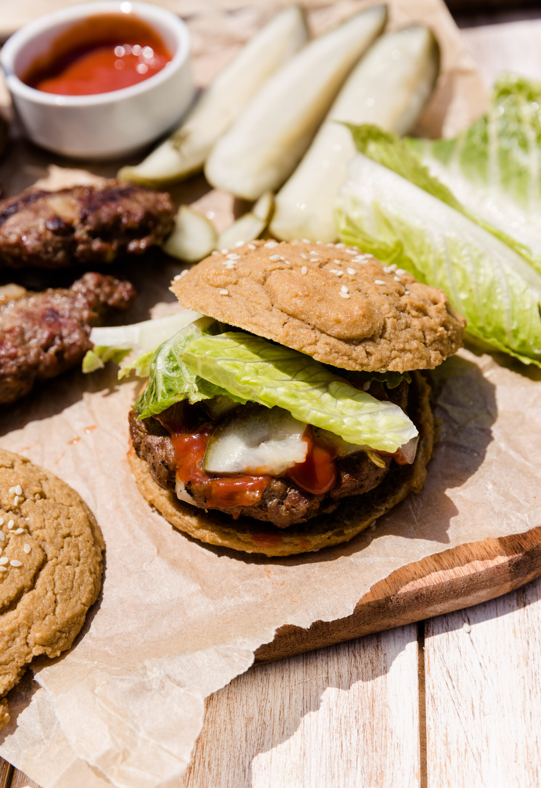 Hamburger with bun tilted off to the side.