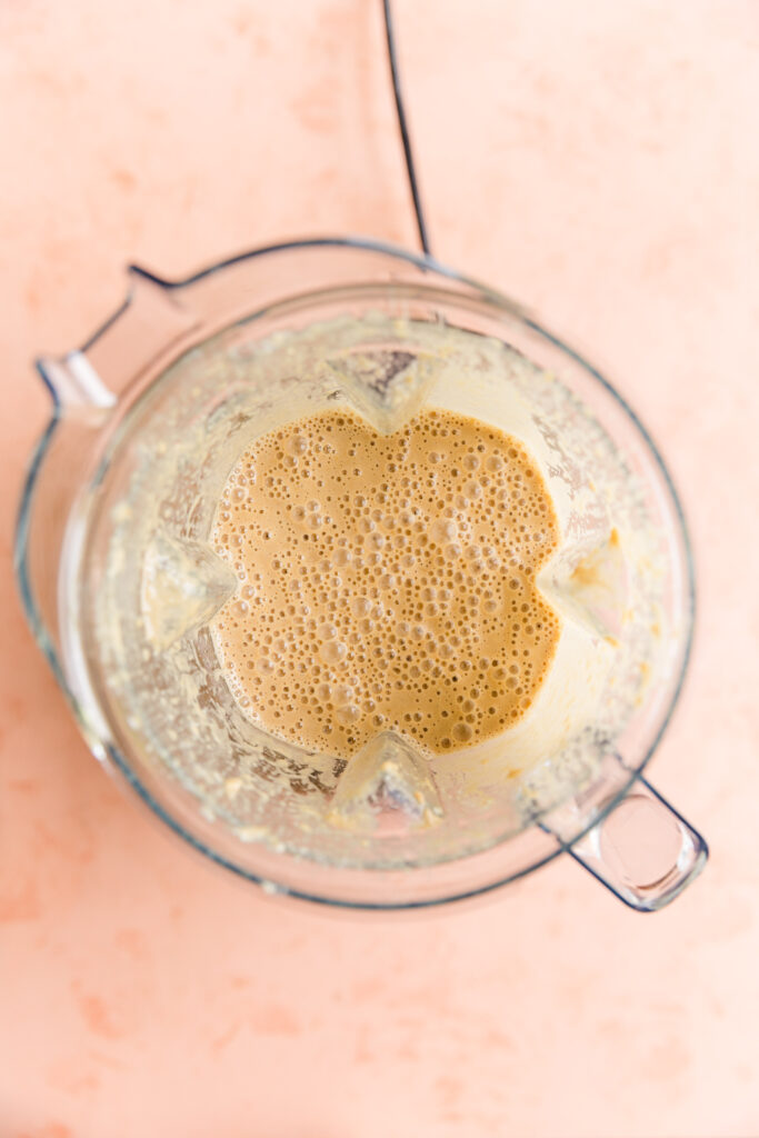 Lemon ice cream mixture in blender.