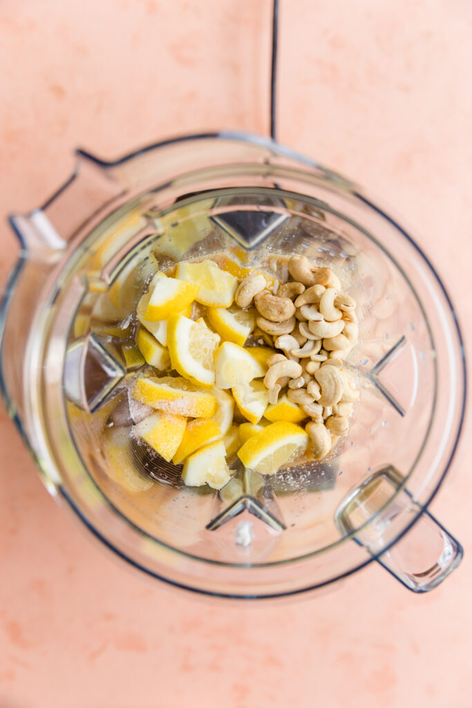 Lemon ice cream ingredients in blender.