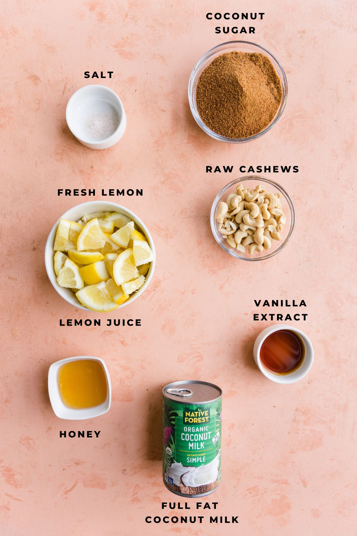 Ingredients measured out in small bowls for lemon ice cream.