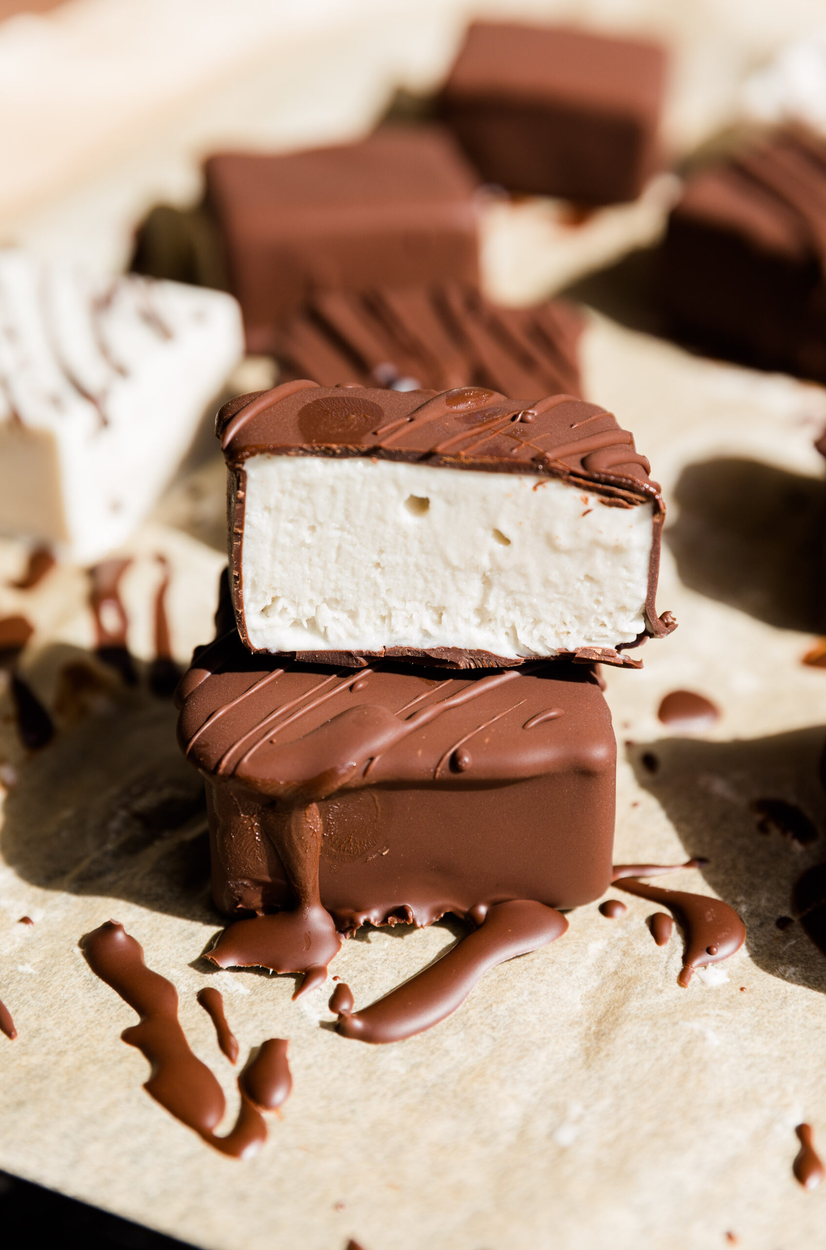 Half of a dairy free Klondike bar stacked on top of another.