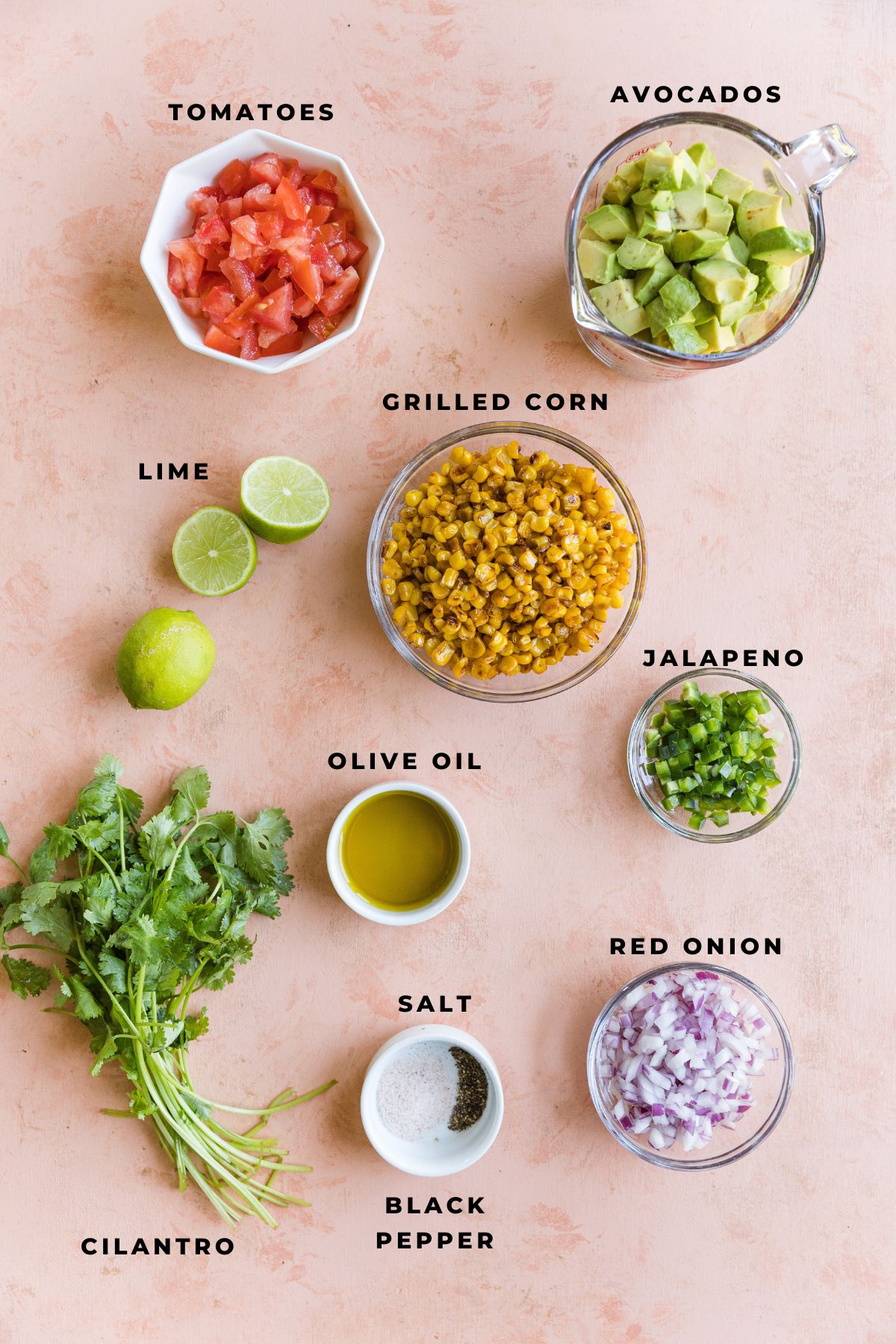 Ingredients measured out for avocado corn salsa.