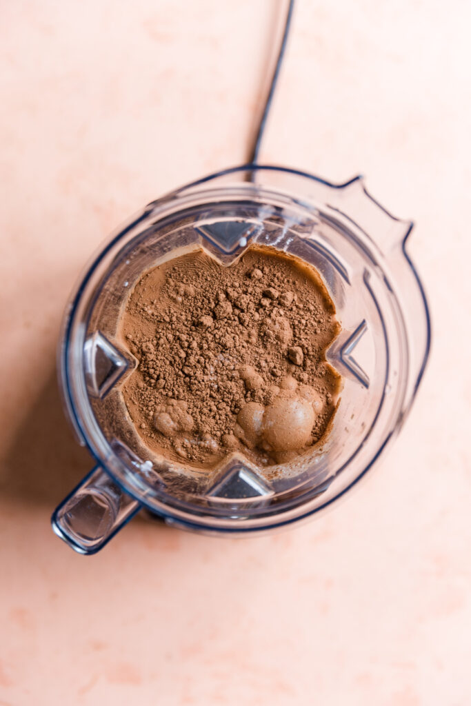 Coffee ice cream ingredients in blender.