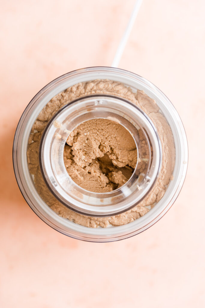 Thick and creamy coffee ice cream in ice cream maker.
