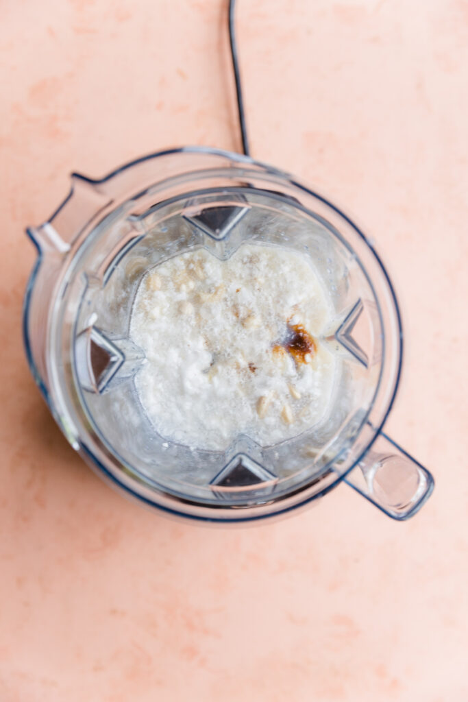 Ingredients for dairy-free vanilla ice cream in blender.