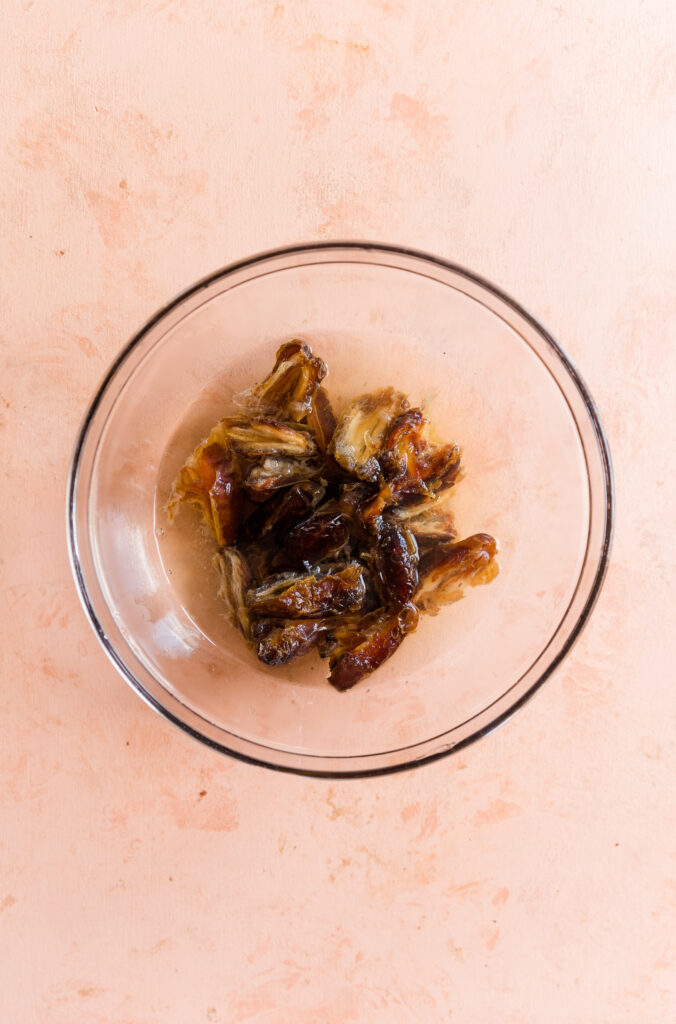 Medjool dates soaking in water.