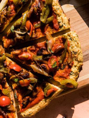 Close up picture of cauliflower pizza slice.