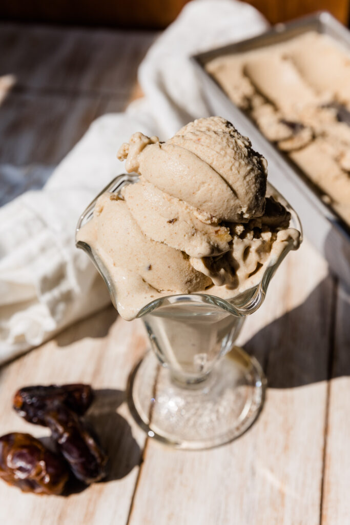 Close up picture of caramel ice cream in ice cream cup.
