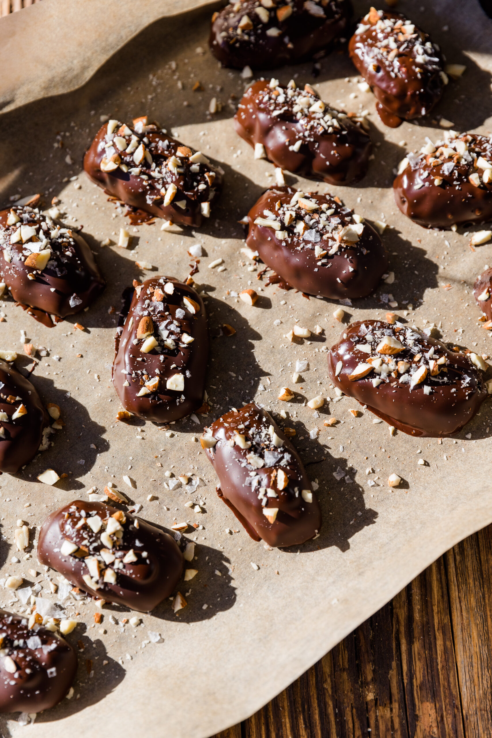 Almond joy candy bars on parchment paper.