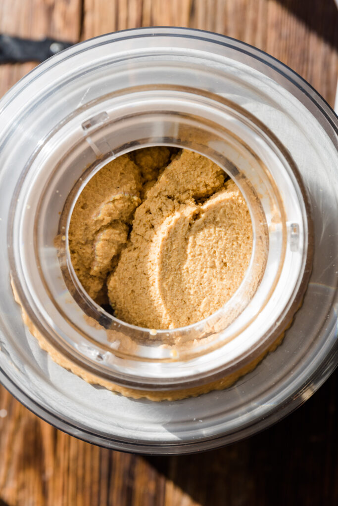 Thick and creamy vegan ice cream in ice cream maker.