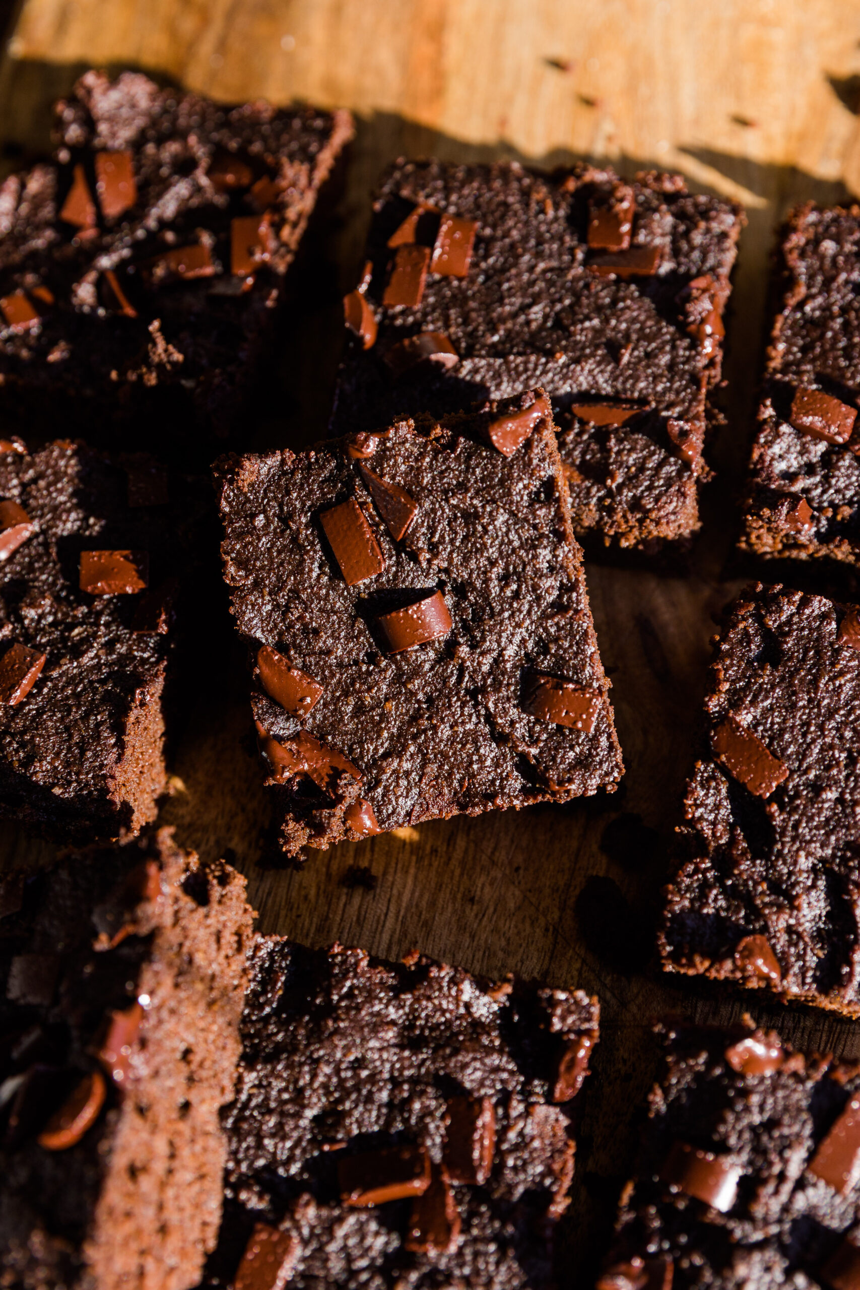 Almond flour brownies with dark chocolate chips on top.