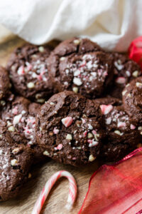 Chocolate peppermint cookies with crushed candy canes on top.
