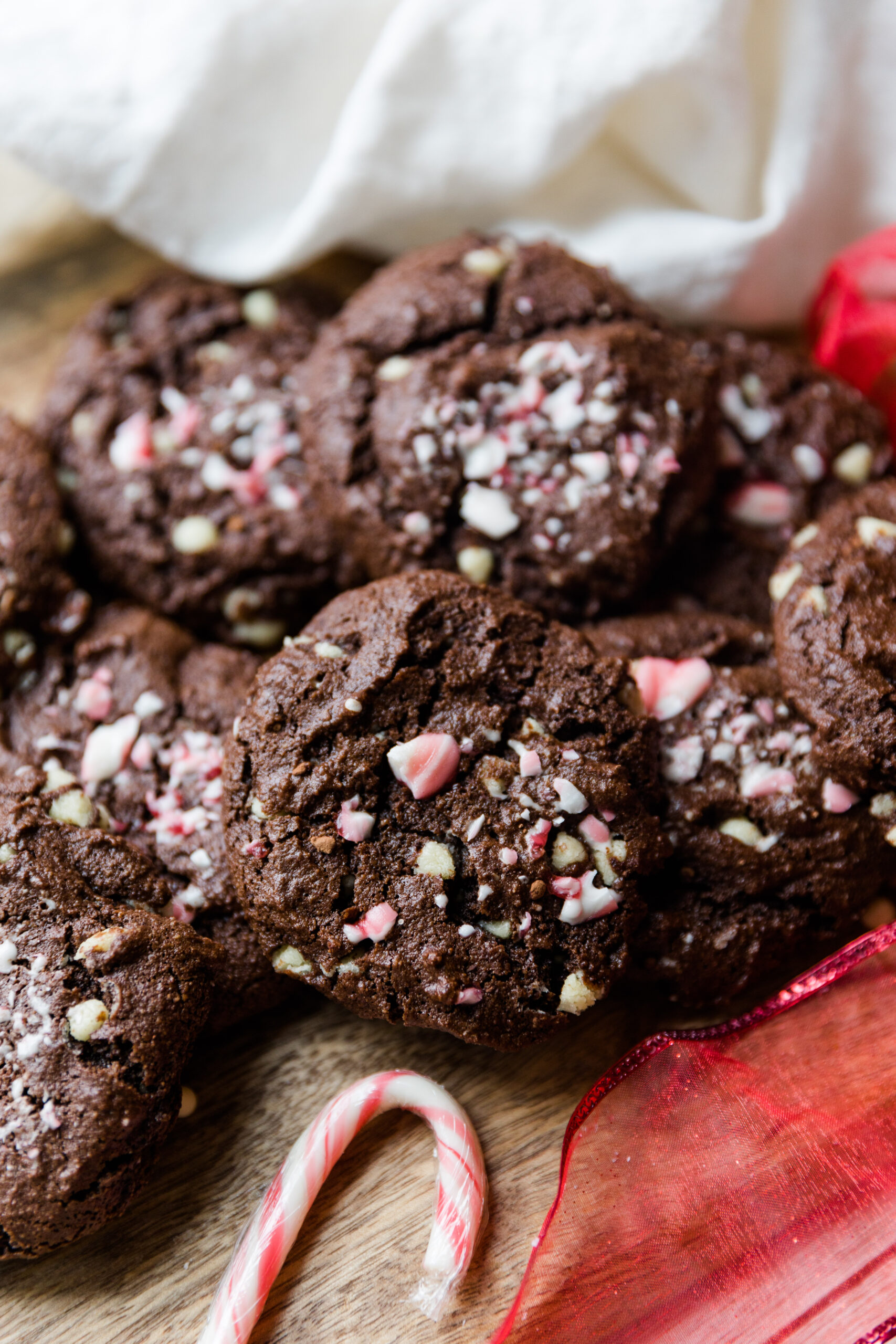 Chocolate peppermint cookies with crushed candy canes on top.