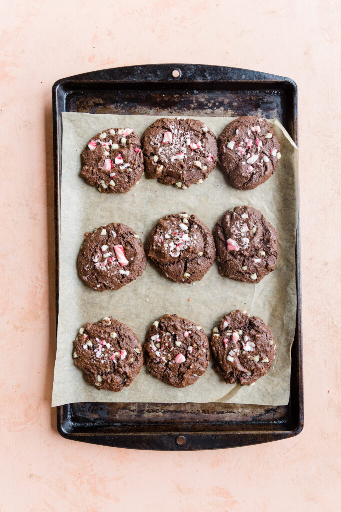 Gluten free chocolate peppermint cookies on a baking tray.