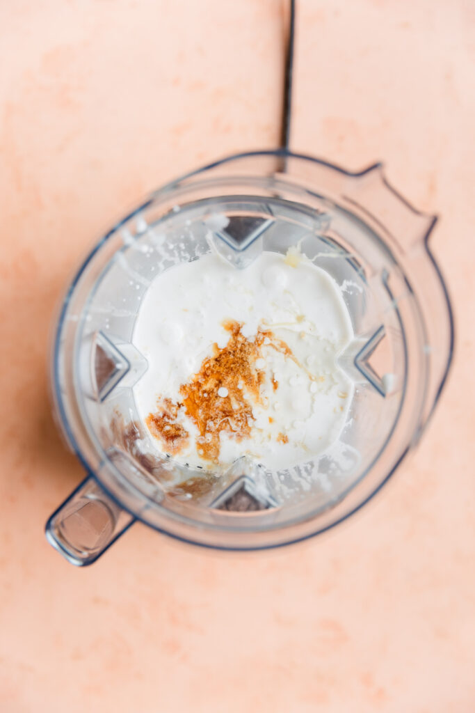 Ingredients for peppermint ice cream in vitamix blender.