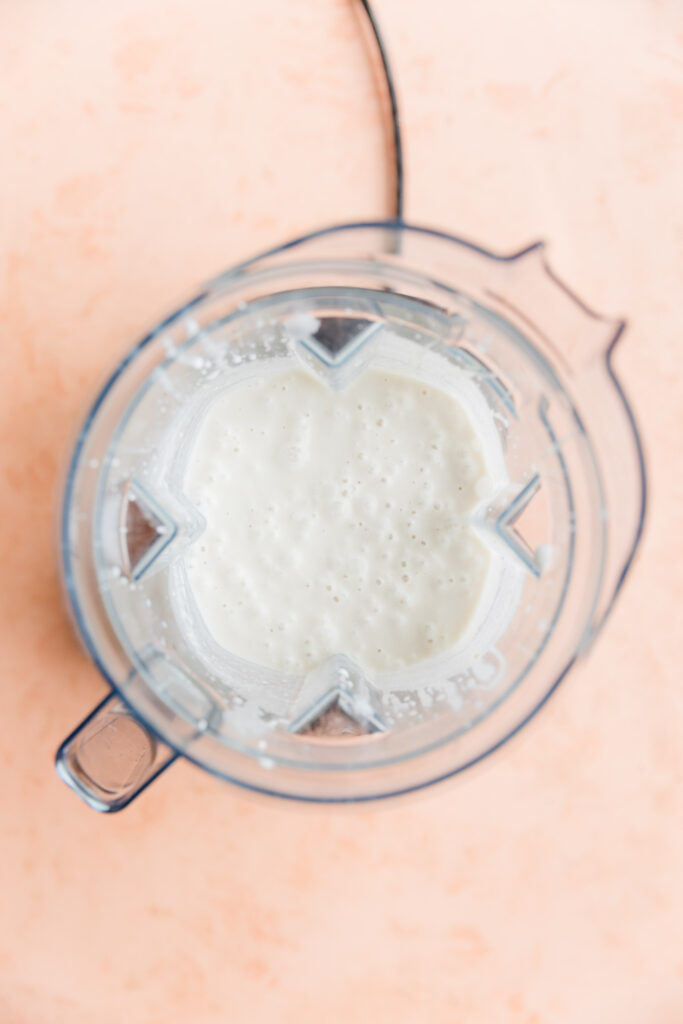Creamy peppermint ice cream in vitamix blender.